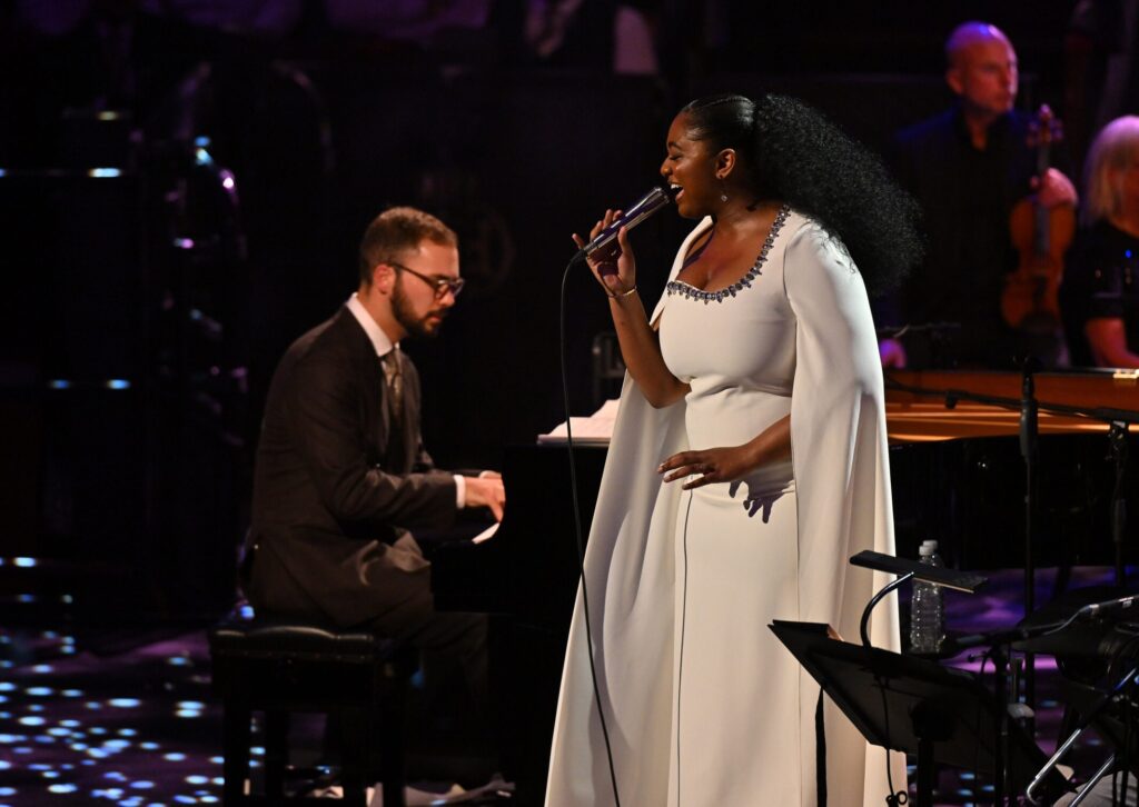 Samara Joy performing on tour